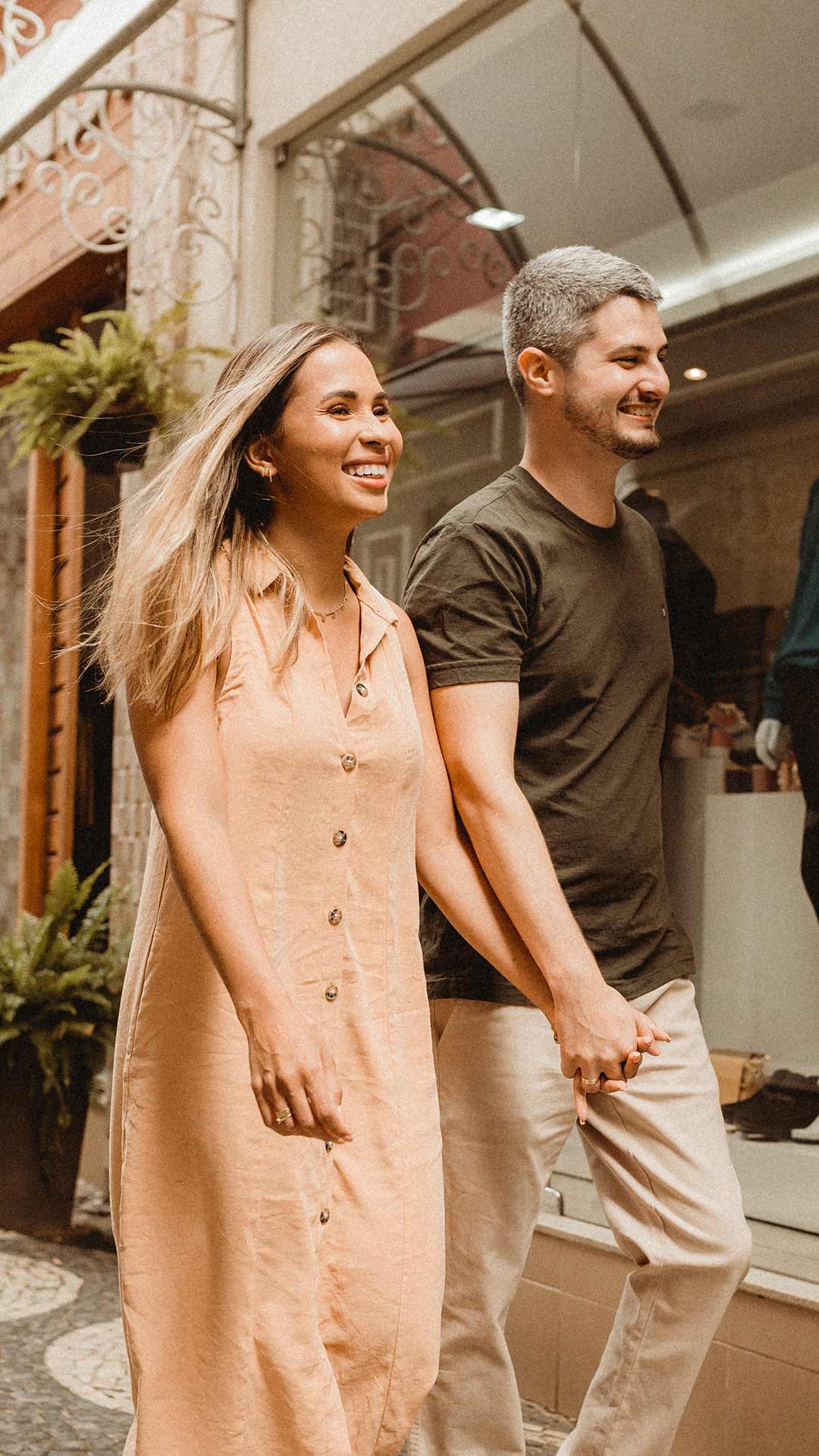 Couple walking hand-in-hand